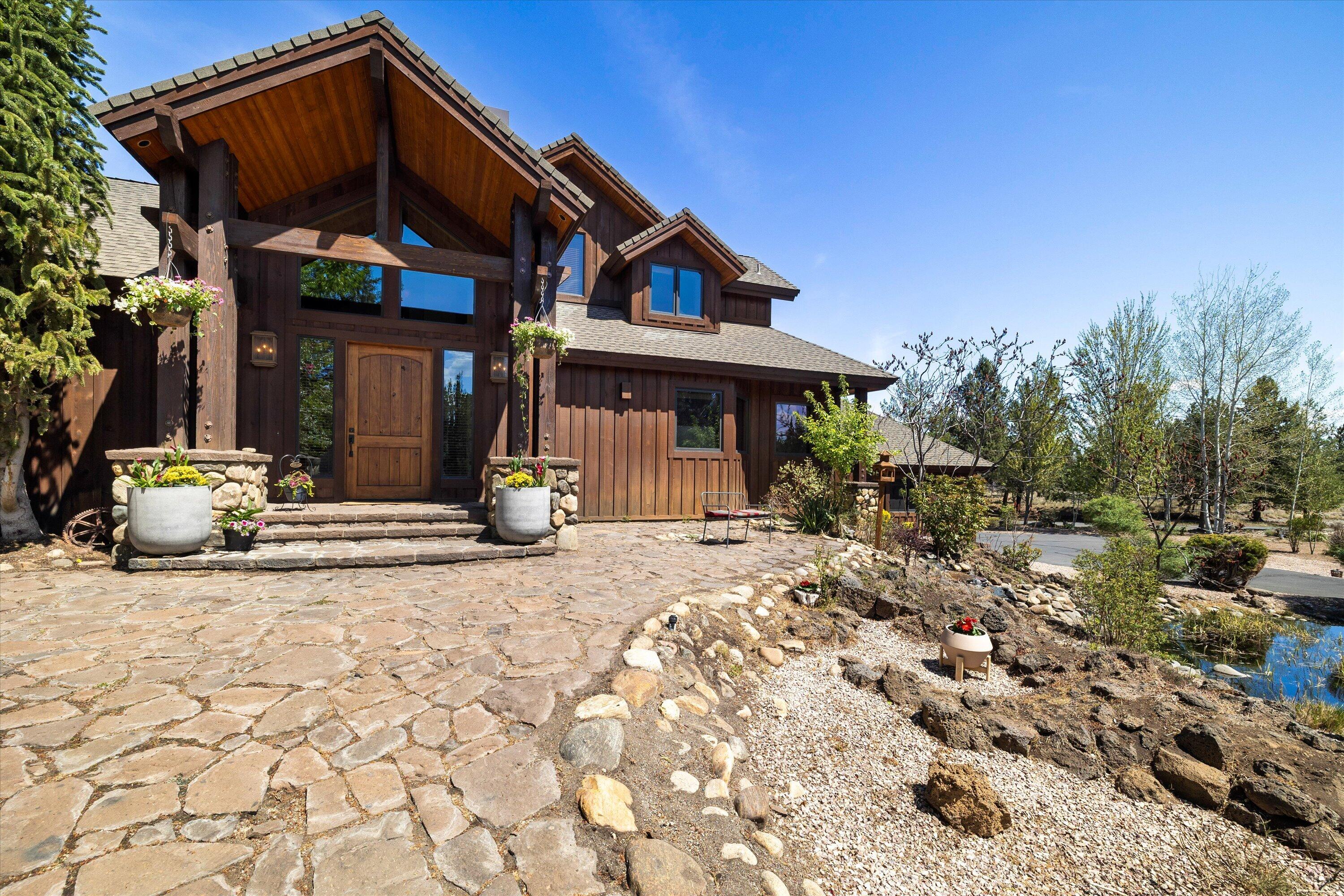 64155 Hunnell Road Bend, OR 97703 - Photo 4 of 96 Distinctive covered entry.