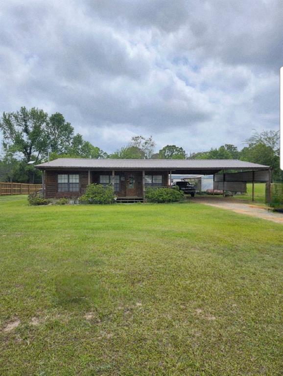 211 Holly Springs Church Road Coushatta, LA 71019 - Photo 2 of 9 a view of a house with a yard