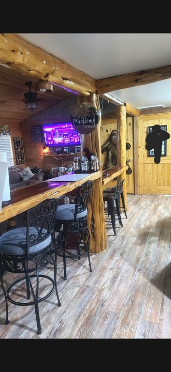 211 Holly Springs Church Road Coushatta, LA 71019 - Photo 6 of 9 a view of a chairs and tables in a patio