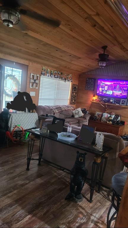211 Holly Springs Church Road Coushatta, LA 71019 - Photo 7 of 9 a room with furniture and wooden floor