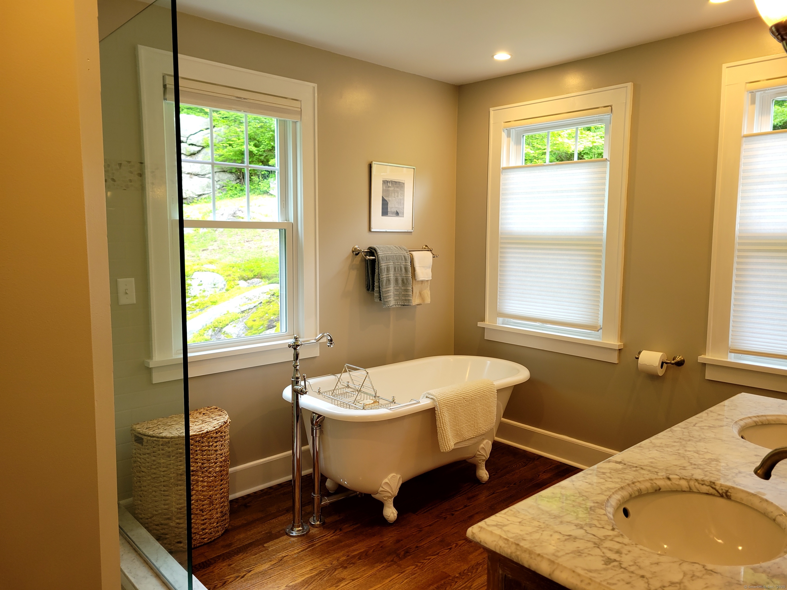 81 West Mountain Road Ridgefield, CT 06877 - Photo 11 of 25 a bathroom with a tub sink and window