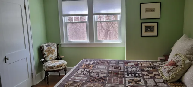 a room with furniture and a window