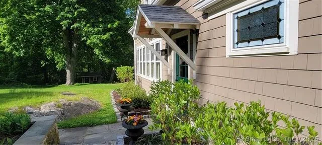a backyard of a house with lots of green space