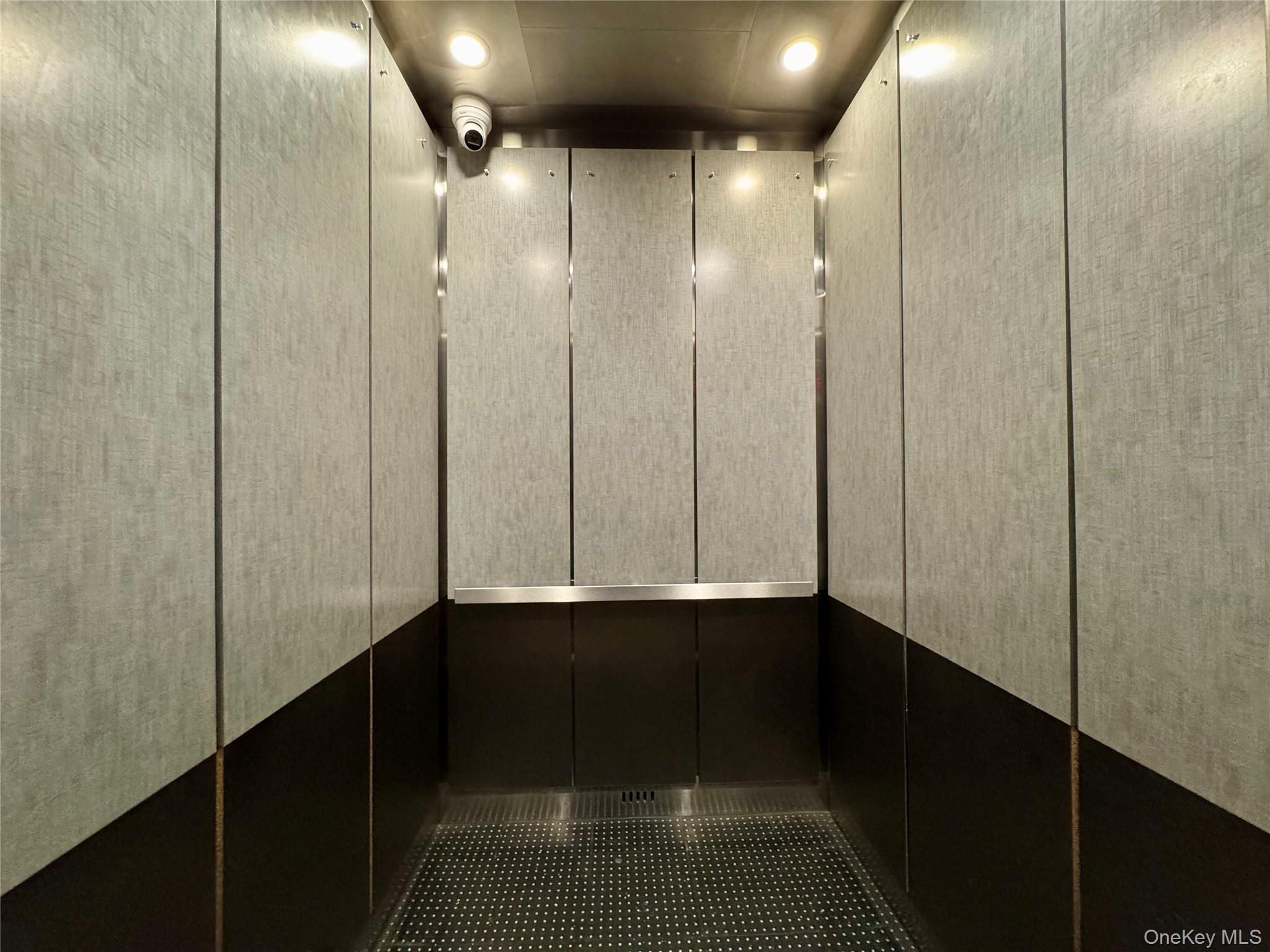 83-64 Talbot Street, Unit 3A Queens, NY 11415 - Photo 14 of 19 Elevator with a security system