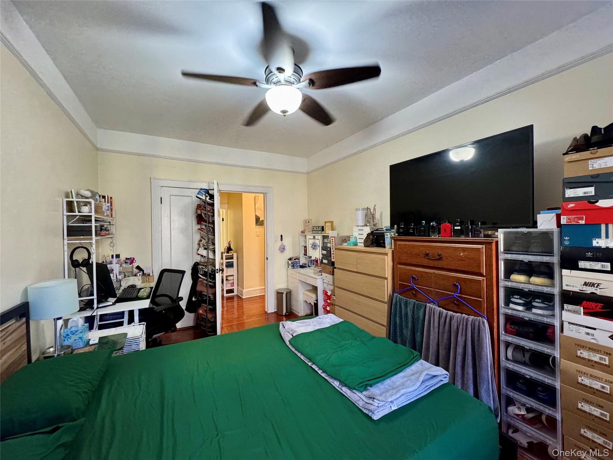 83-64 Talbot Street, Unit 3A Queens, NY 11415 - Photo 8 of 19 Bedroom featuring a ceiling fan
