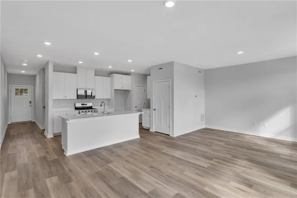 a view of kitchen with wooden floor