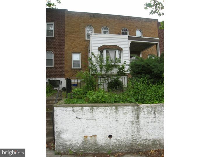 7041 Clinton Road Upper Darby, PA 19082 - Photo 1 of 6 a front view of a house with a yard
