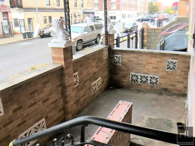 a view of balcony with furniture