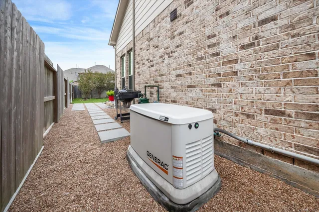 a bathroom with a sink a toilet and a shower