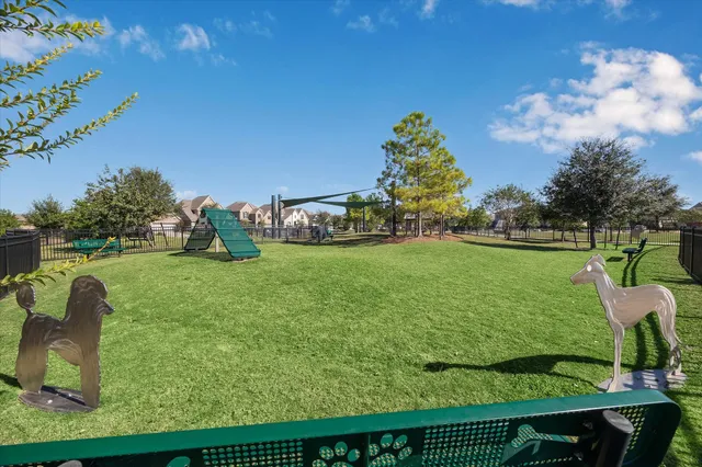 a view of a golf course with a garden