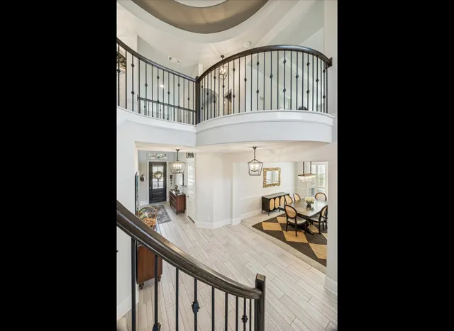 a view of a living room and a balcony