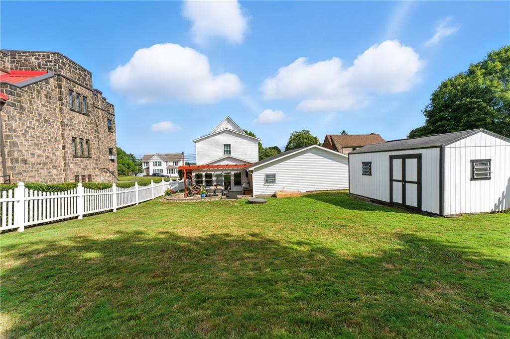 519 West Ridge Avenue Sharpsville, PA 16150 - Photo 35 of 48 a view of a house with a yard and sitting area