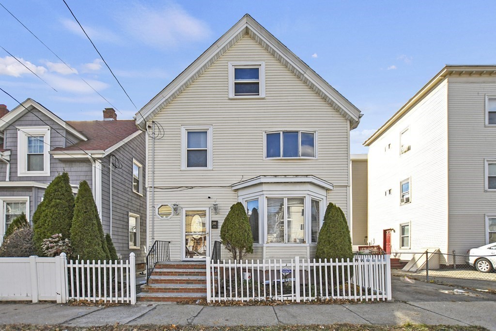 a front view of a house with a porch