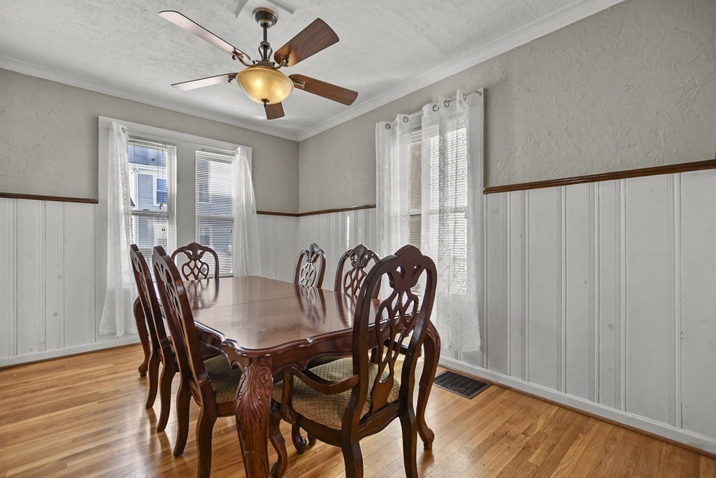 242 Eastern Avenue Lynn, MA 01902 - Photo 11 of 23 a view of a dining room with furniture window and wooden floor