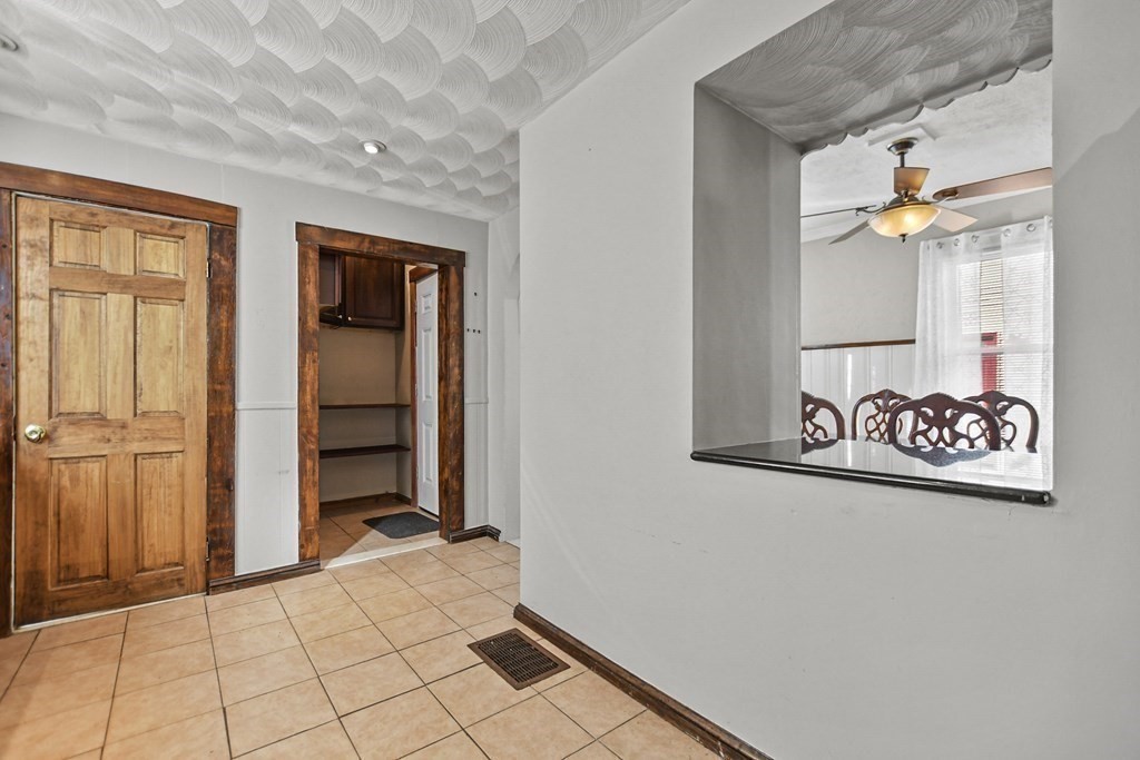 242 Eastern Avenue Lynn, MA 01902 - Photo 8 of 23 a view of a hallway and wooden floor