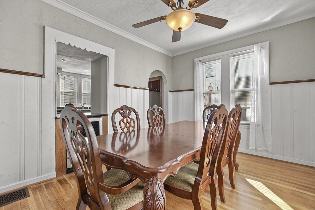 242 Eastern Avenue Lynn, MA 01902 - Photo 9 of 23 a view of a dining room with furniture and wooden floor