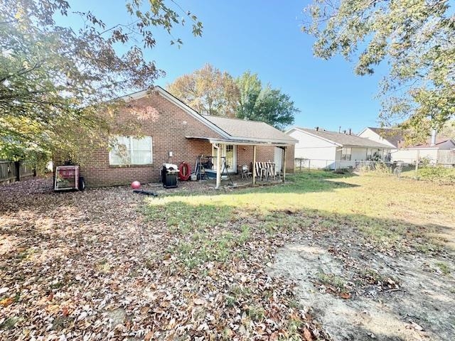 4636 Vincent Road Millington, TN 38053 - Photo 3 of 15 Back of house featuring a yard