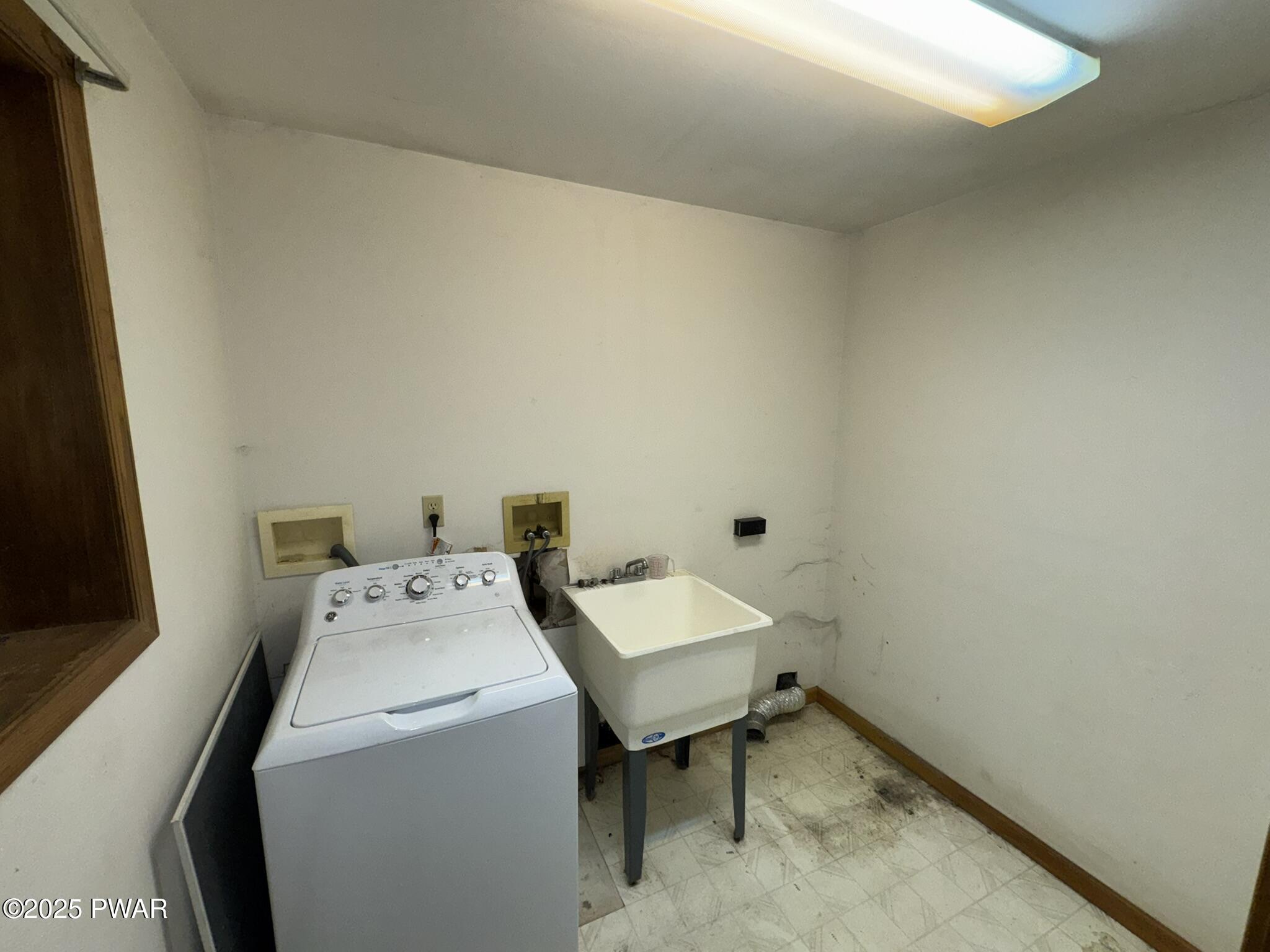 21 Tuthill Road Waymart, PA 18472 - Photo 36 of 49 a utility room with dryer and washer