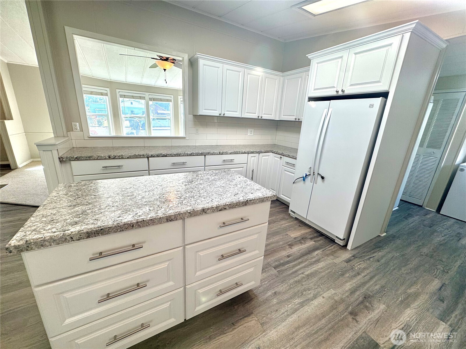 1218 South 3rd Street Dayton, WA 99328 - Photo 11 of 23 a bathroom with a granite countertop sink and a mirror