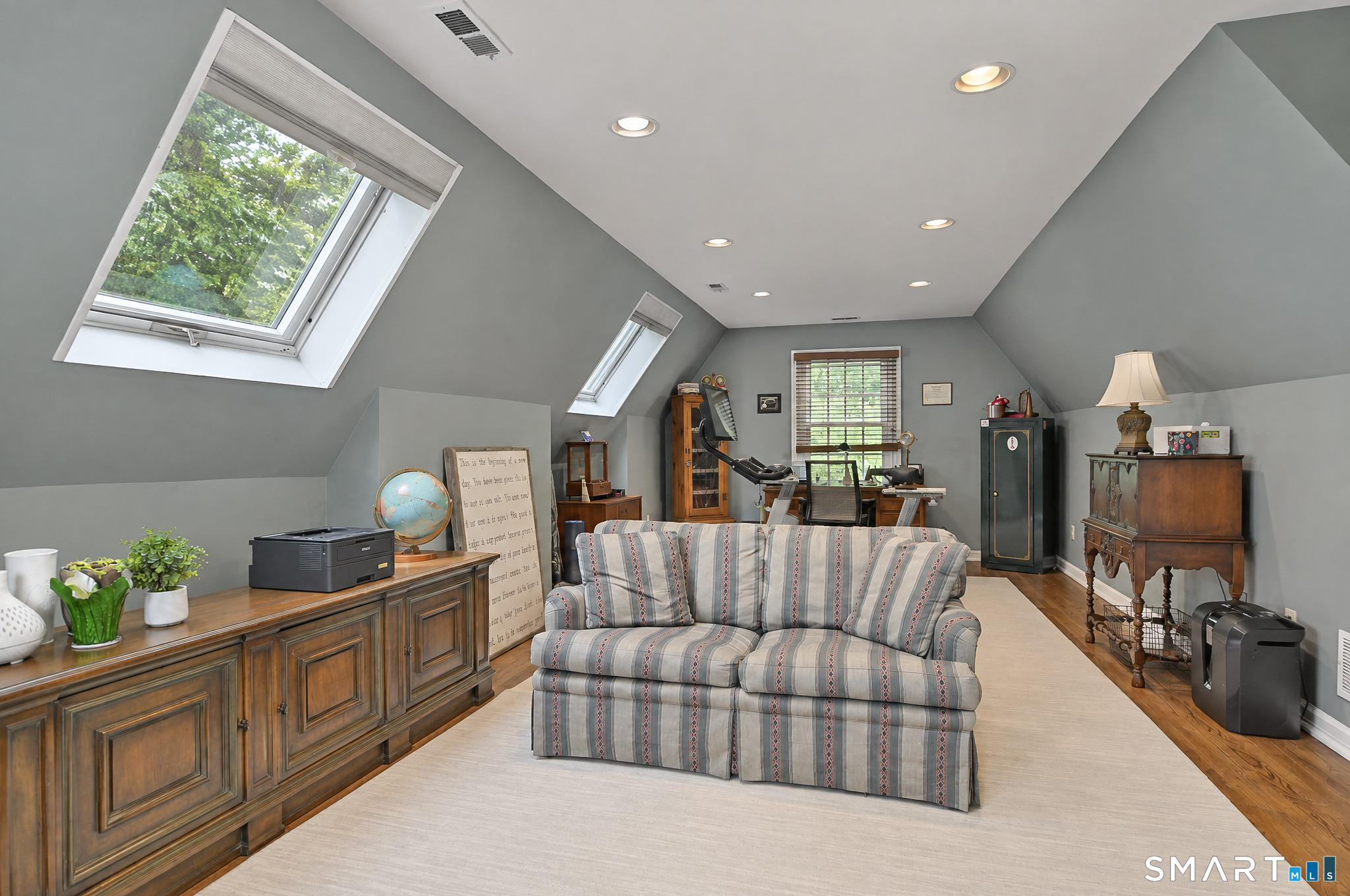 16 Winding Brook Road Newtown, CT 06470 - Photo 25 of 39 Spacious bonus room with skylights and flexible living space.