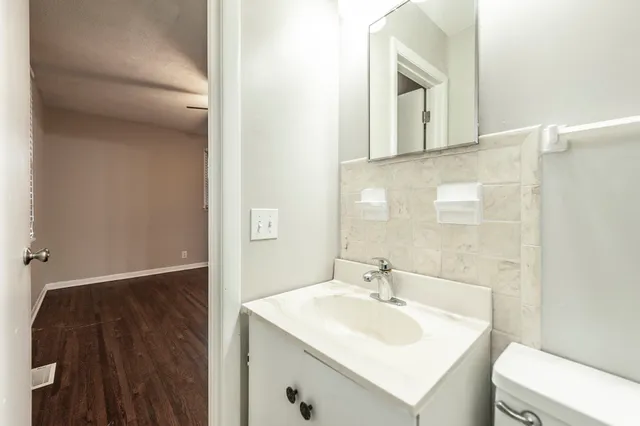 a bathroom with a sink and a toilet