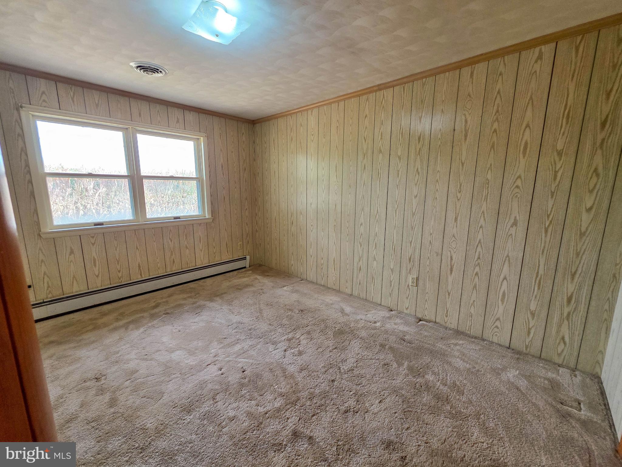 820 Storms Store Road Gettysburg, PA 17325 - Photo 12 of 39 a view of an empty room with a window