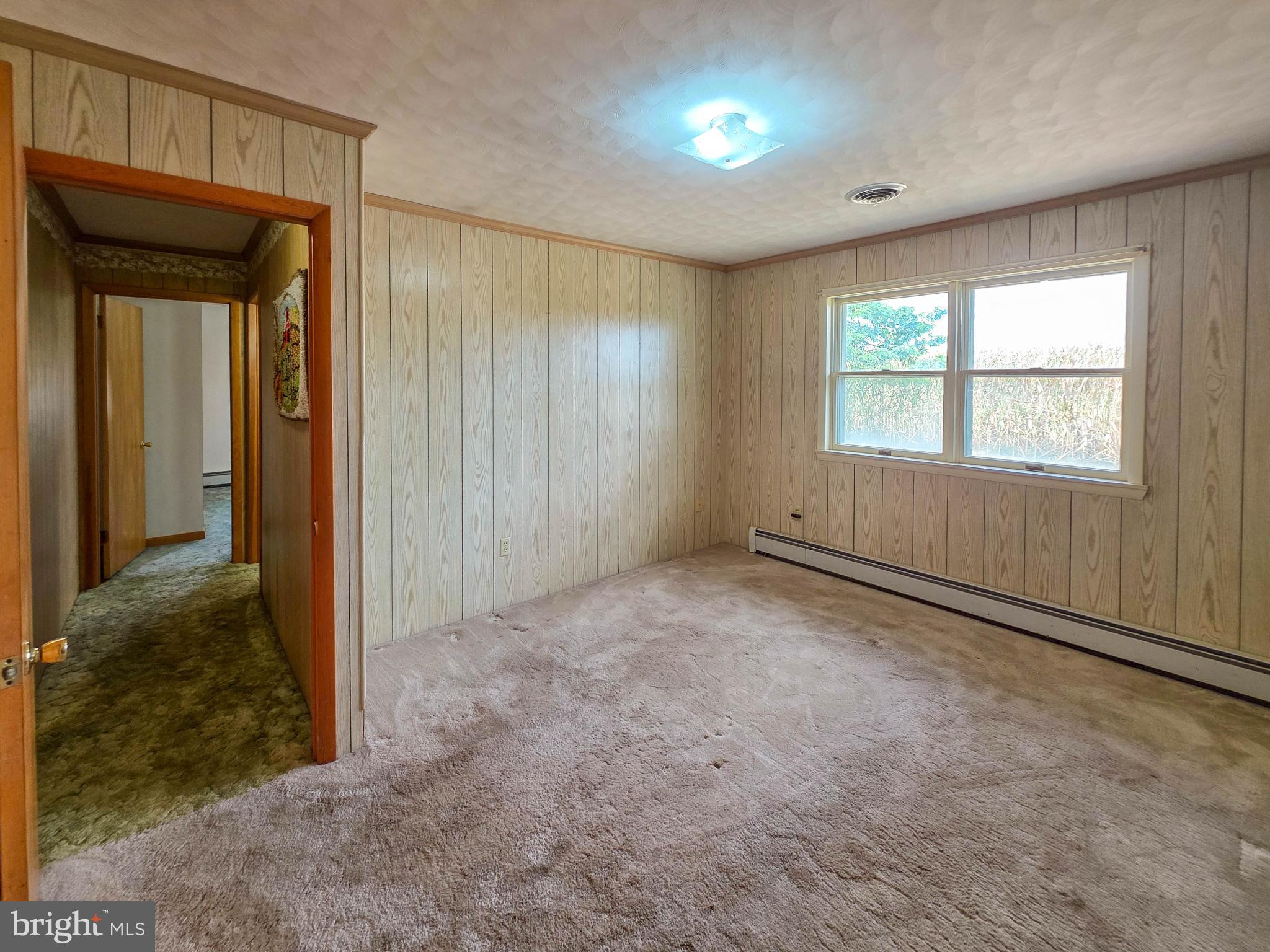 820 Storms Store Road Gettysburg, PA 17325 - Photo 14 of 39 an empty room with windows