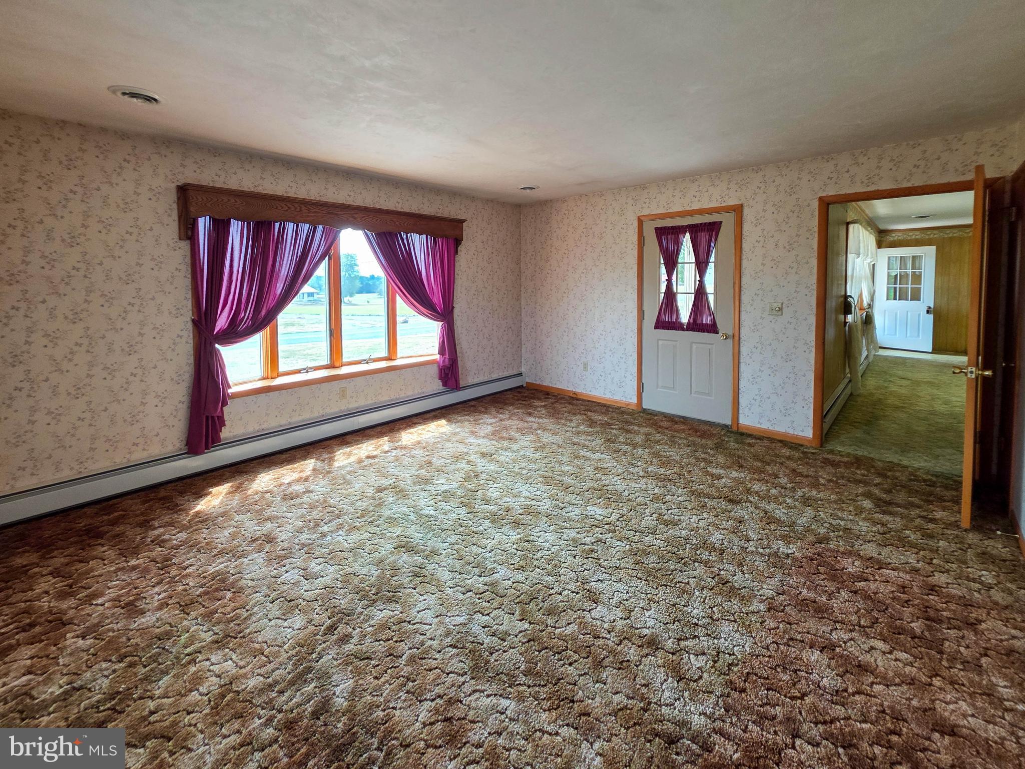 820 Storms Store Road Gettysburg, PA 17325 - Photo 18 of 39 an empty room with windows