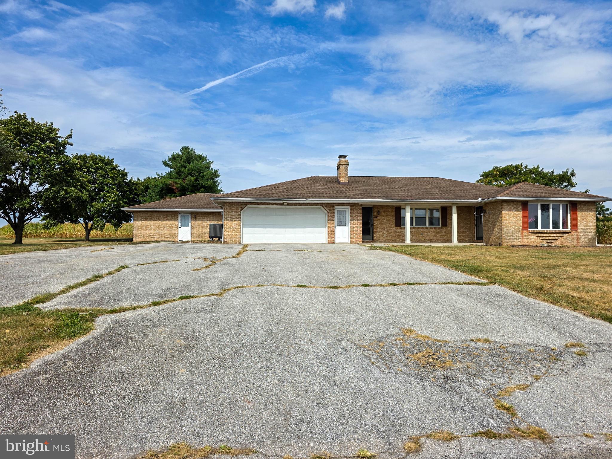 820 Storms Store Road Gettysburg, PA 17325 - Photo 2 of 39 front view of a house with a street