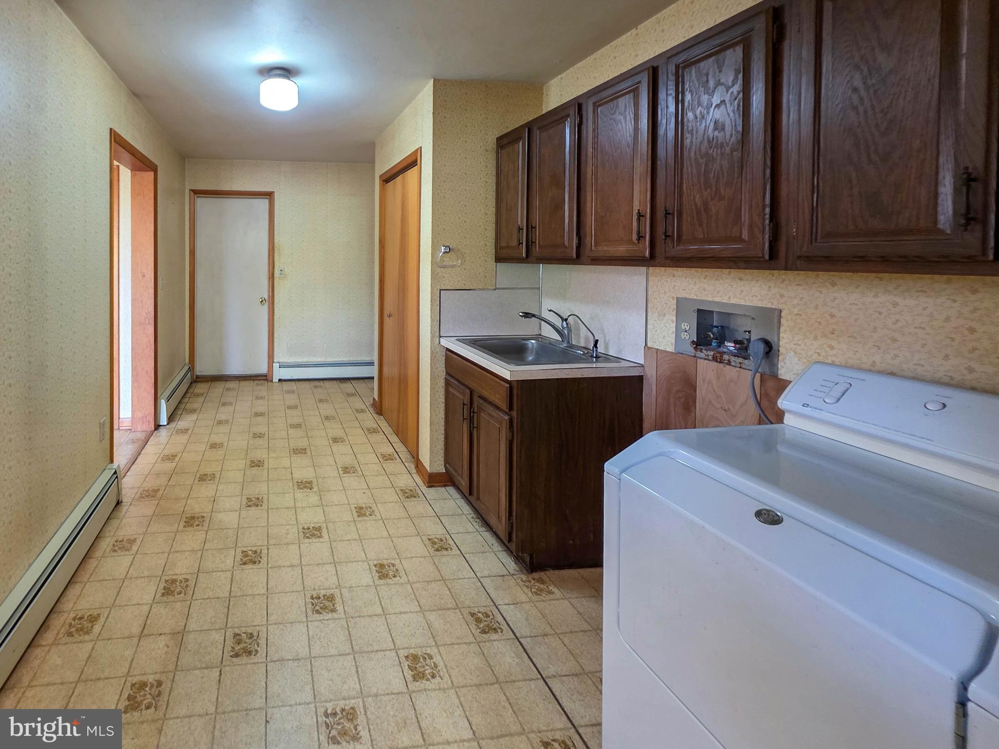 820 Storms Store Road Gettysburg, PA 17325 - Photo 24 of 39 a kitchen with a cabinets and a stove top oven