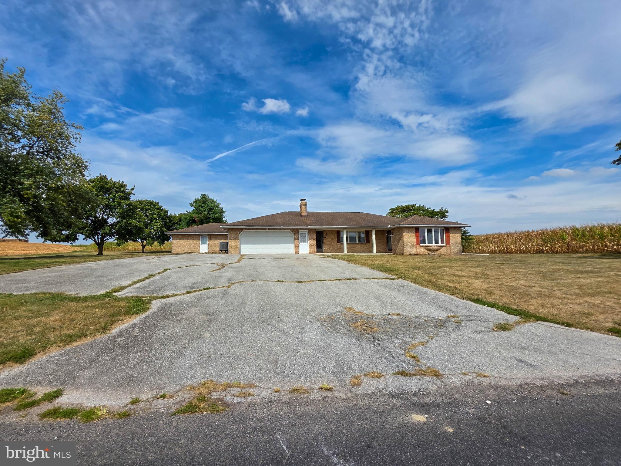 820 Storms Store Road Gettysburg, PA 17325 - Photo 6 of 39 a front view of a house with a yard