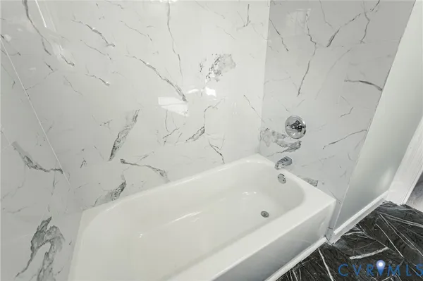 a bathroom with a bathtub