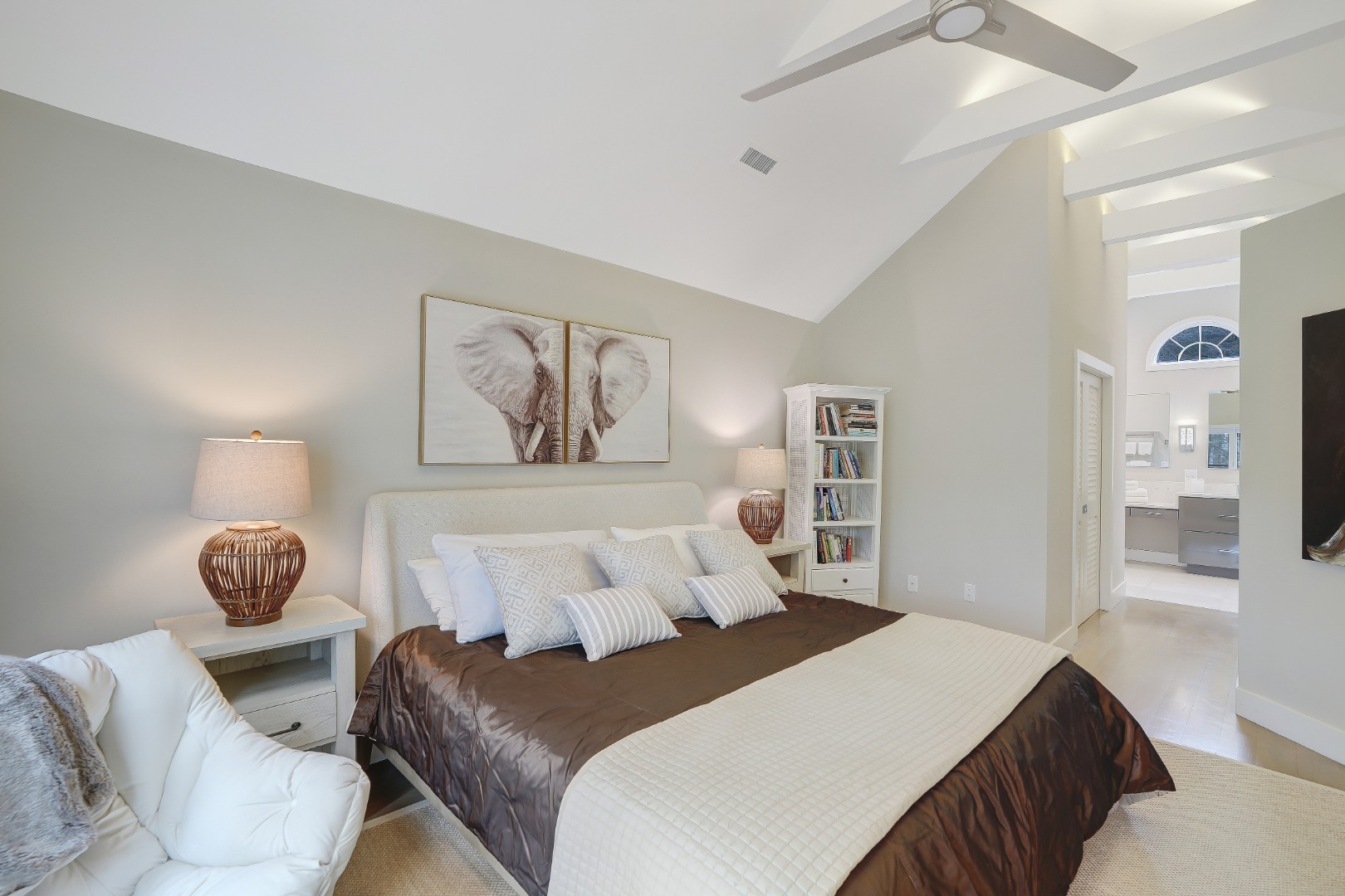 150 Cove Road, Unit 10 Vineyard Haven, MA 02568 - Photo 17 of 43 Primary bedroom with beamed cathedral ceilings, en suite bath & walk-in closet.