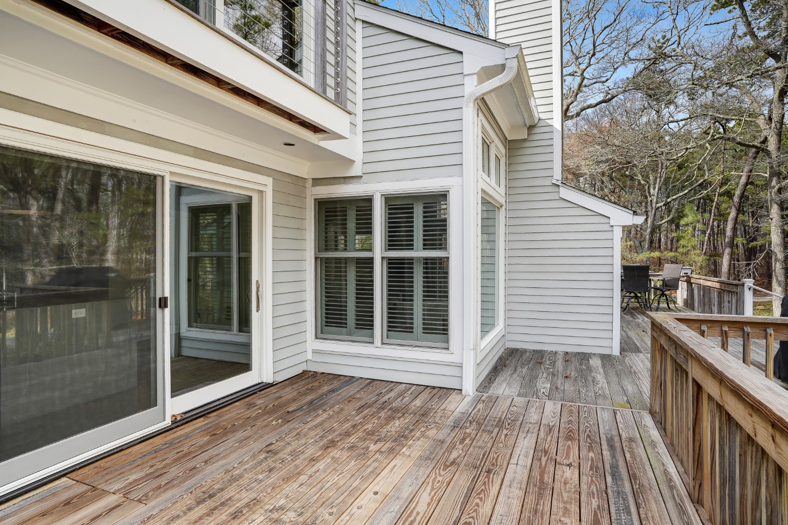 150 Cove Road, Unit 10 Vineyard Haven, MA 02568 - Photo 33 of 43 A large deck wraps around the exterior of the unit.