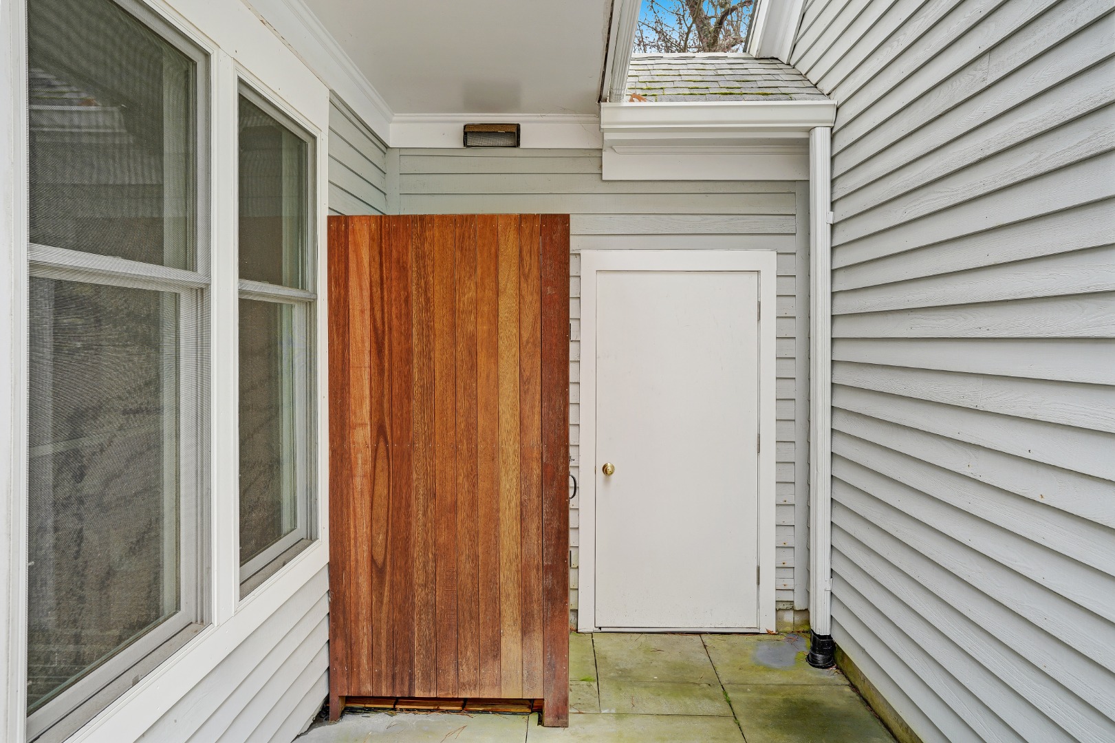 150 Cove Road, Unit 10 Vineyard Haven, MA 02568 - Photo 35 of 43 Outdoor shower with mahogany enclosure.