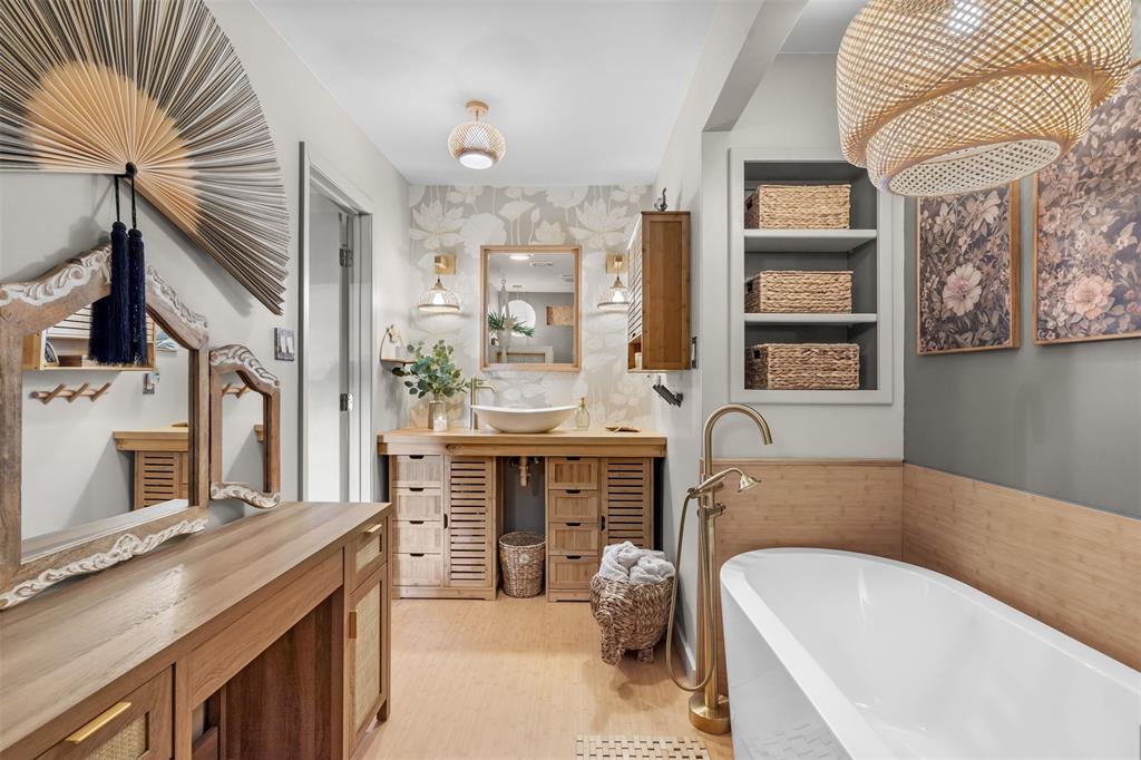 9700 Nix Road Tolar, TX 76476 - Photo 36 of 39 a bathroom with a tub sink and mirror