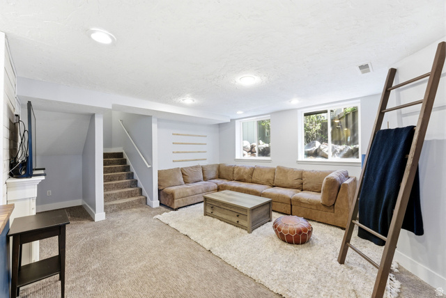 7935 Mustang Loop Road Park City, UT 84098 - Photo 31 of 60 Spacious recreation room featuring recessed lighting, light gray walls, and plush carpet flooring