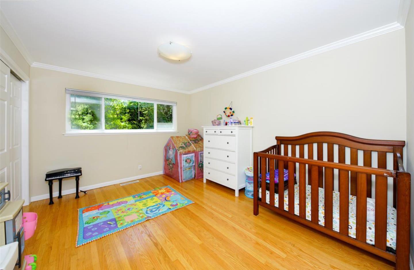 2273 Beckham Way Hayward, CA 94541 - Photo 4 of 11 a bedroom with a bed and a window