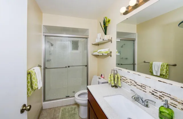 a bathroom with a sink and toilet