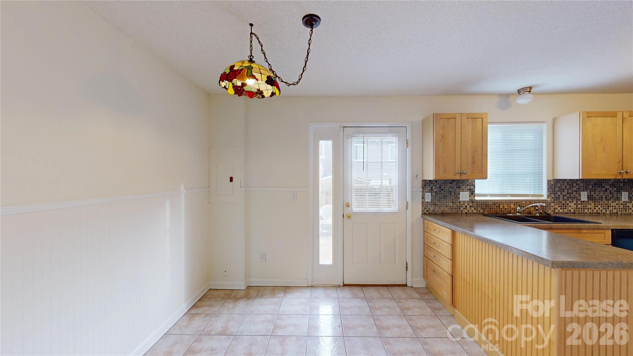 1211 Scaleybark Road Charlotte, NC 28209 - Photo 17 of 29 a view of a kitchen with a sink
