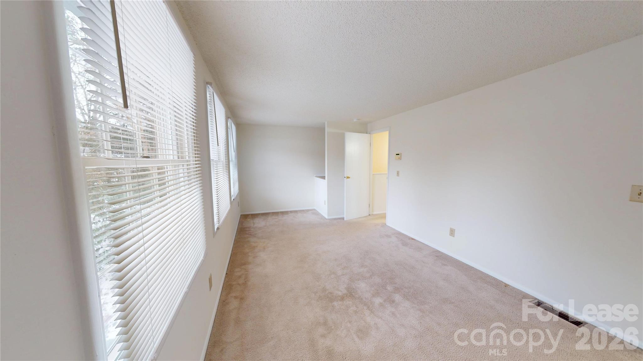 1211 Scaleybark Road Charlotte, NC 28209 - Photo 19 of 29 a view of a room with a white walls