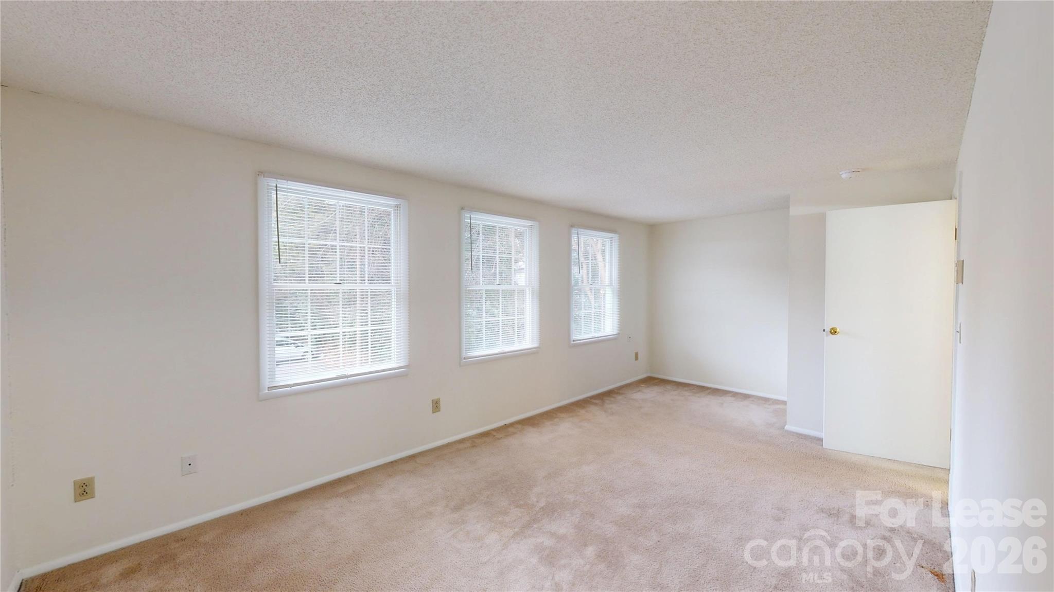 1211 Scaleybark Road Charlotte, NC 28209 - Photo 20 of 29 an empty room with windows