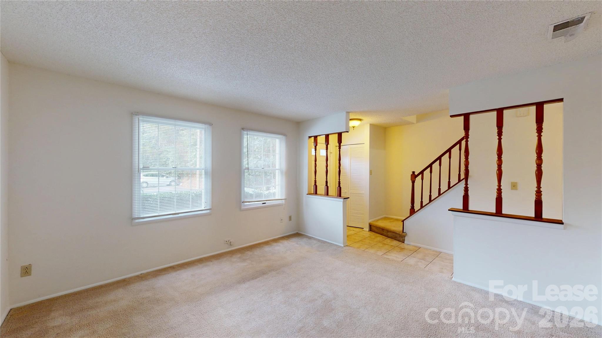 1211 Scaleybark Road Charlotte, NC 28209 - Photo 3 of 29 a view of an empty room with a window
