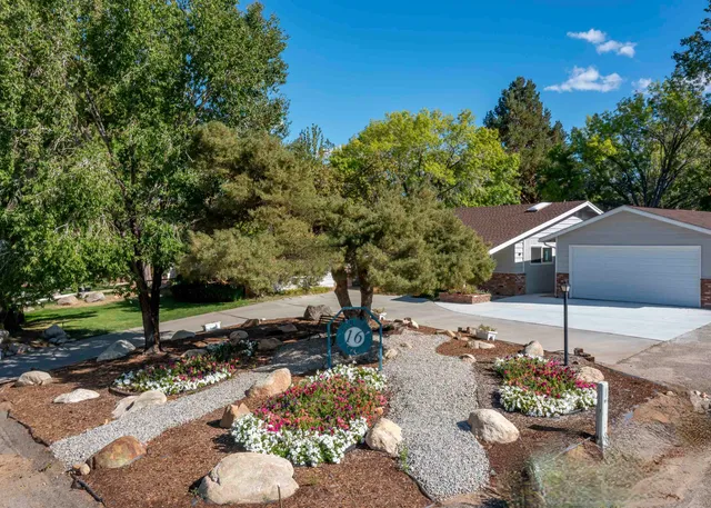 a view of a garden with a patio