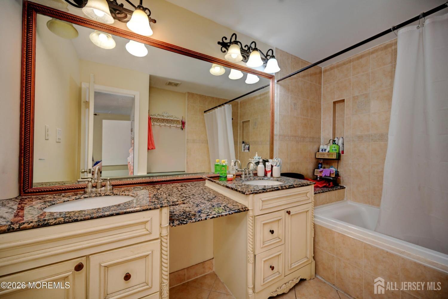 22 Borell Square Parlin, NJ 08859 - Photo 17 of 32 a bathroom with a sink and a mirror