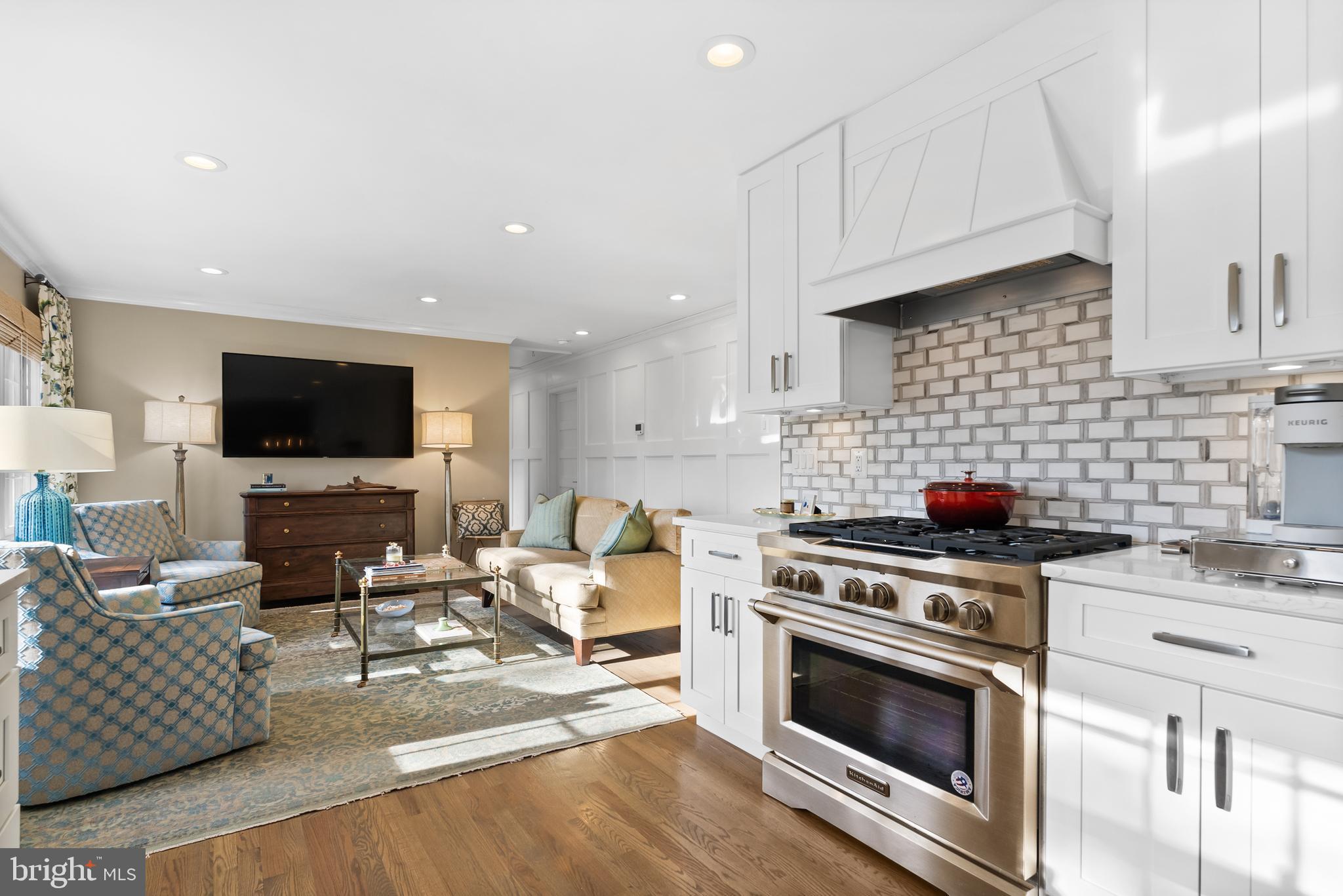 1101 Gatewood Drive Alexandria, VA 22307 - Photo 26 of 63 a kitchen with stainless steel appliances a stove a sink a microwave and a refrigerator