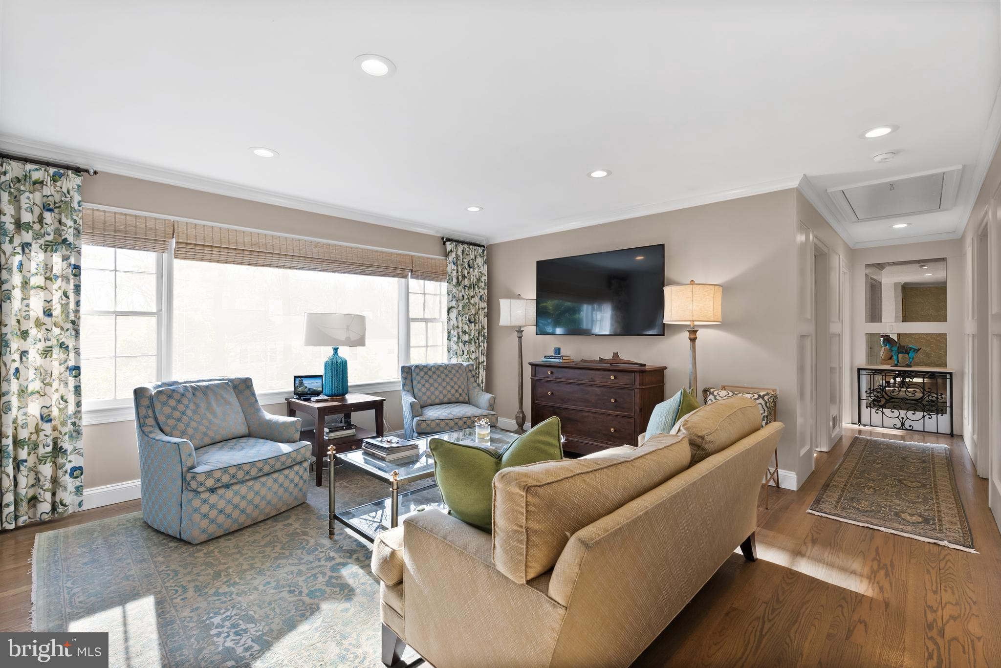 1101 Gatewood Drive Alexandria, VA 22307 - Photo 27 of 63 a living room with furniture and a flat screen tv
