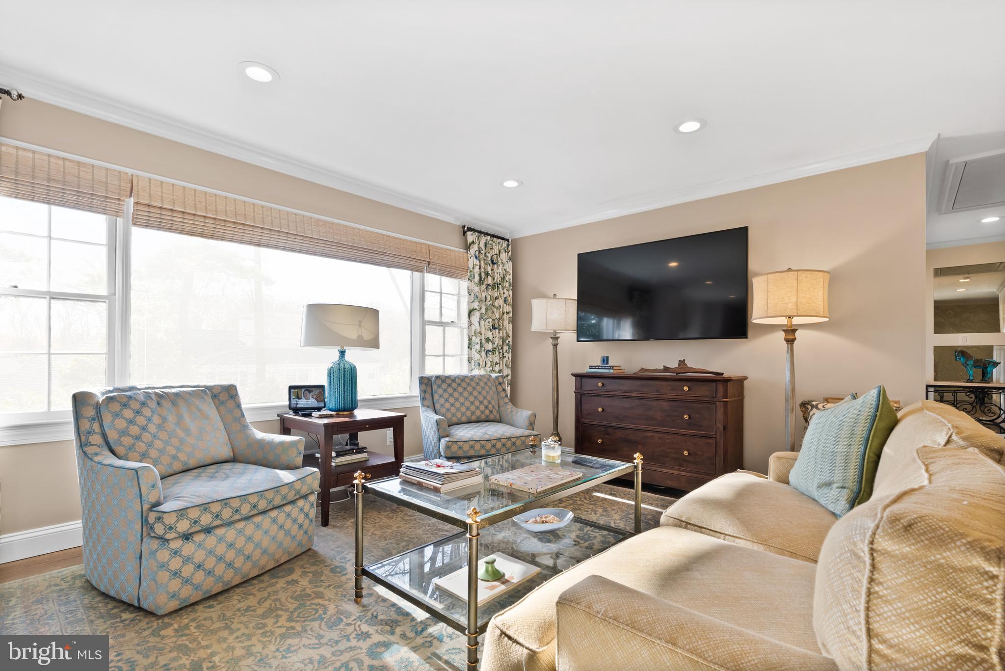 1101 Gatewood Drive Alexandria, VA 22307 - Photo 28 of 63 a living room with furniture and a flat screen tv