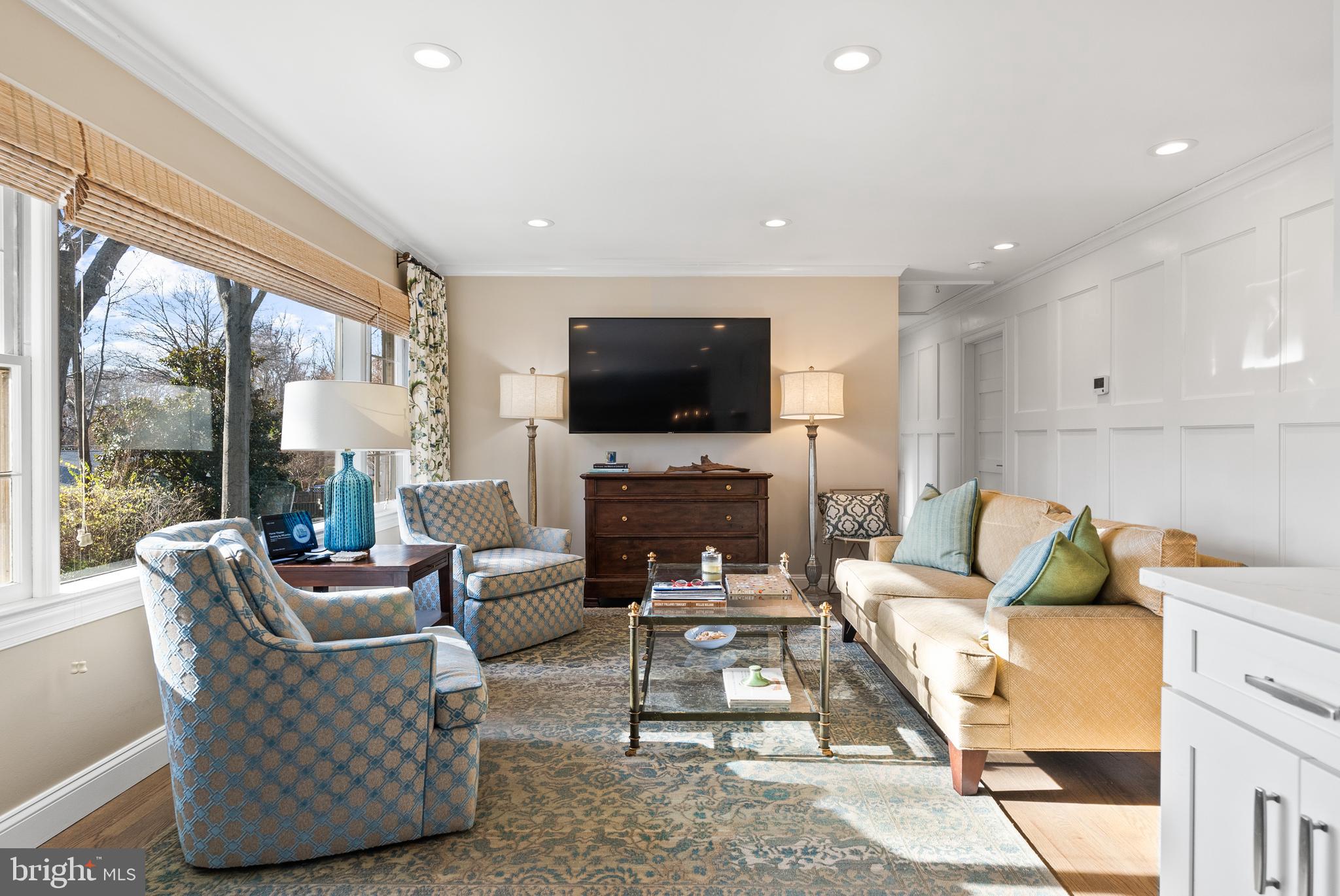 1101 Gatewood Drive Alexandria, VA 22307 - Photo 31 of 63 a living room with furniture a fireplace and a flat screen tv