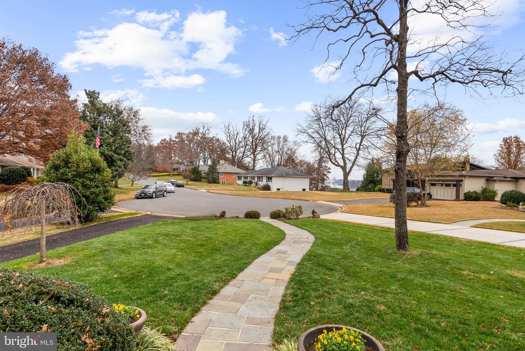 1101 Gatewood Drive Alexandria, VA 22307 - Photo 4 of 63 a swimming pool with lots of tress in front of it